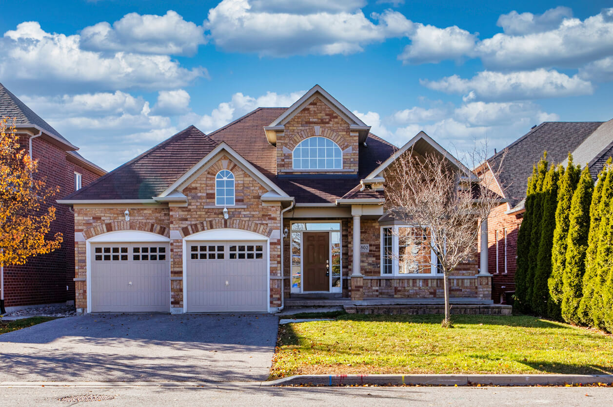 Stone Home Exterior of attractive two-story home in residential neighborhood.
