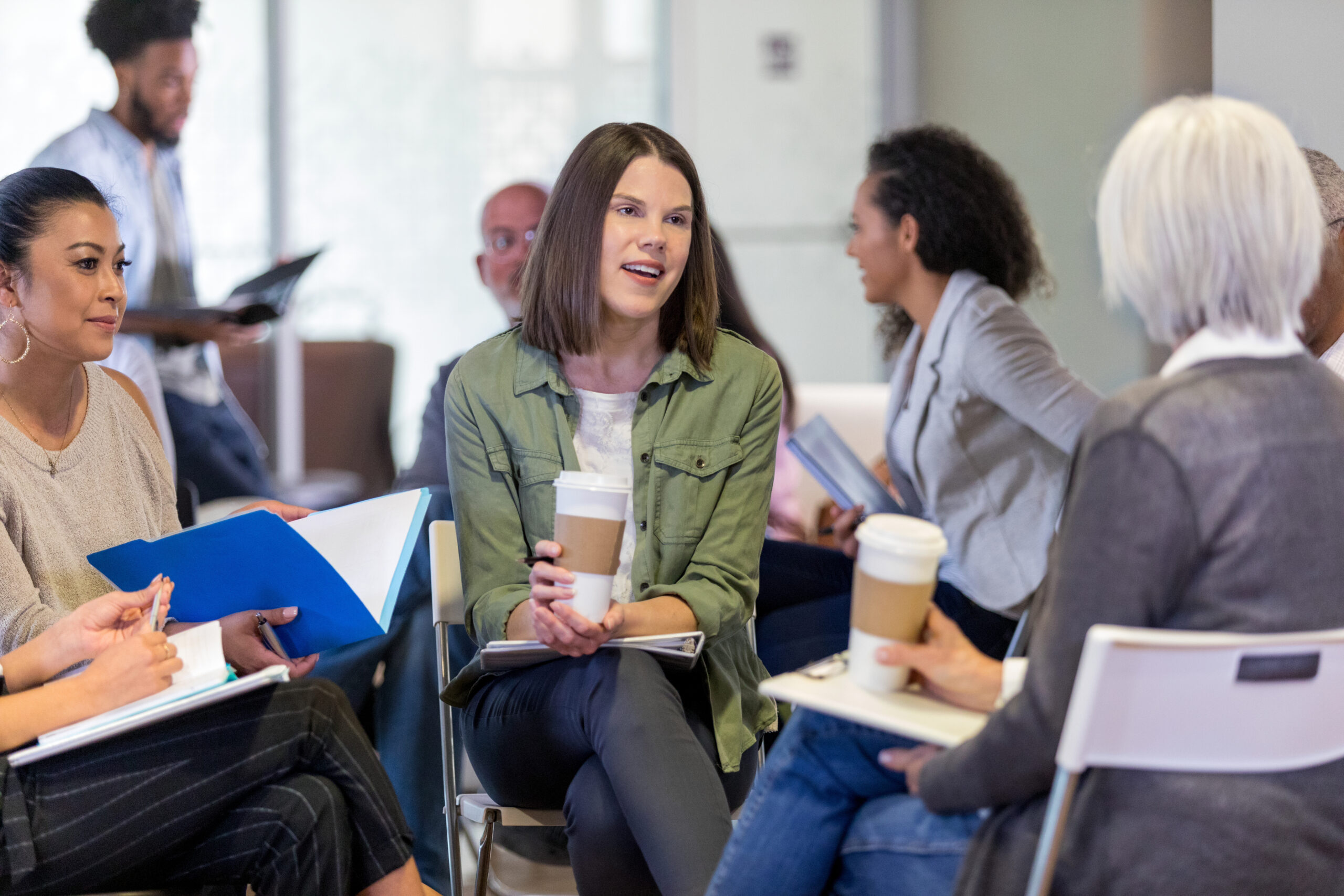 New member of homeowners association introduces herself in small group