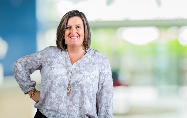 HThomas24 Smiling portrait of Hope Thomas, a Senior Client Advisor at Deeley Insurance Group.