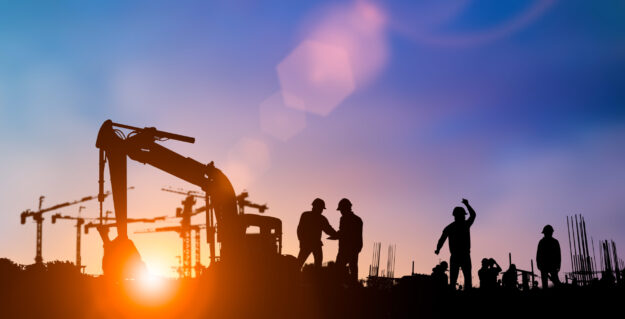Silhouette of engineer and construction team working at site over blurred background for industry background with Light fair.Create from multiple reference images together This document is not intended to be an exhaustive source of information nor should any discussion or opinions be construed as legal advice. Readers should consult legal counsel or a licensed insurance professional for appropriate advice.