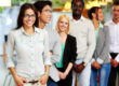 Group of smiling young business people